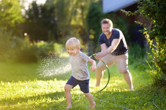 family enjoying tick-free yard after turf doctor tick control services