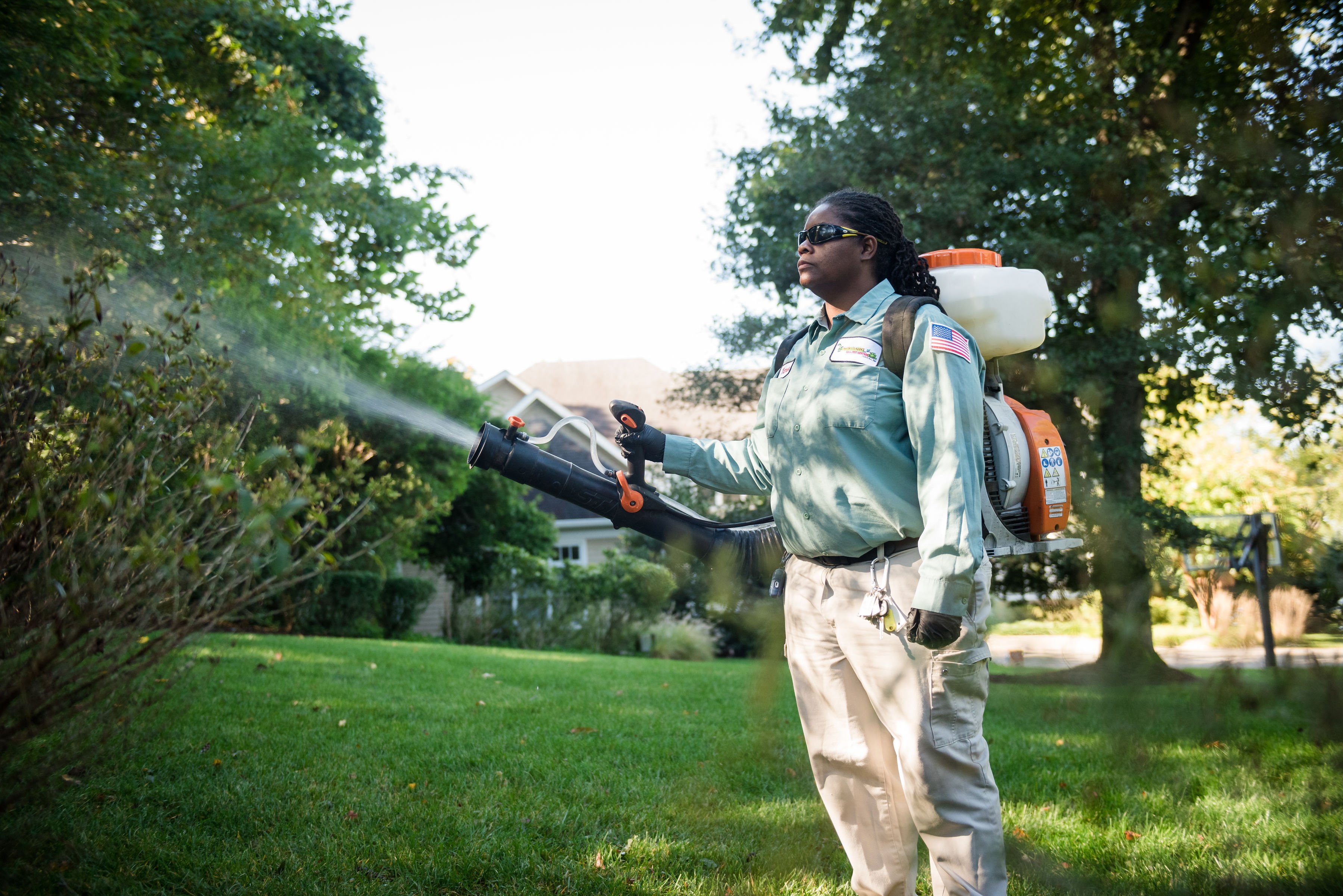 oakland turf doctor technician applying mosquito control