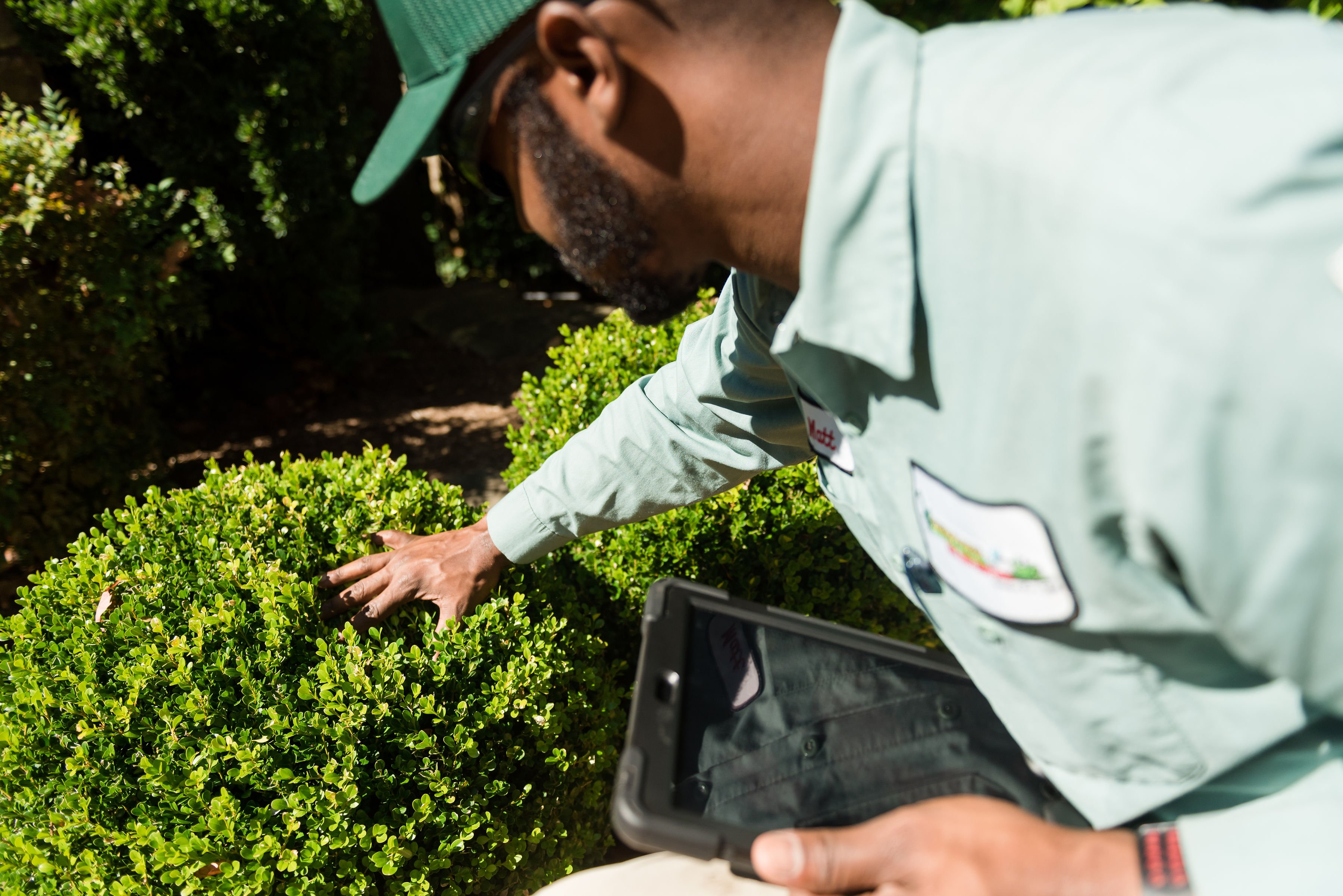 turf doctor hallowell tech inspecting landscape
