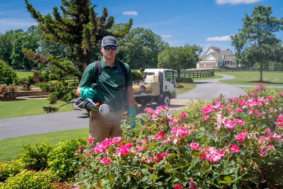 turf doctor hallowell technician applying pest control-1