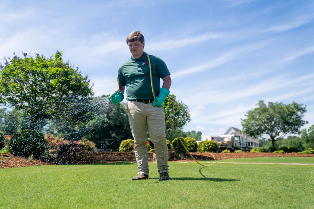 turf doctor winthrop lawn tech applying liquid aeration